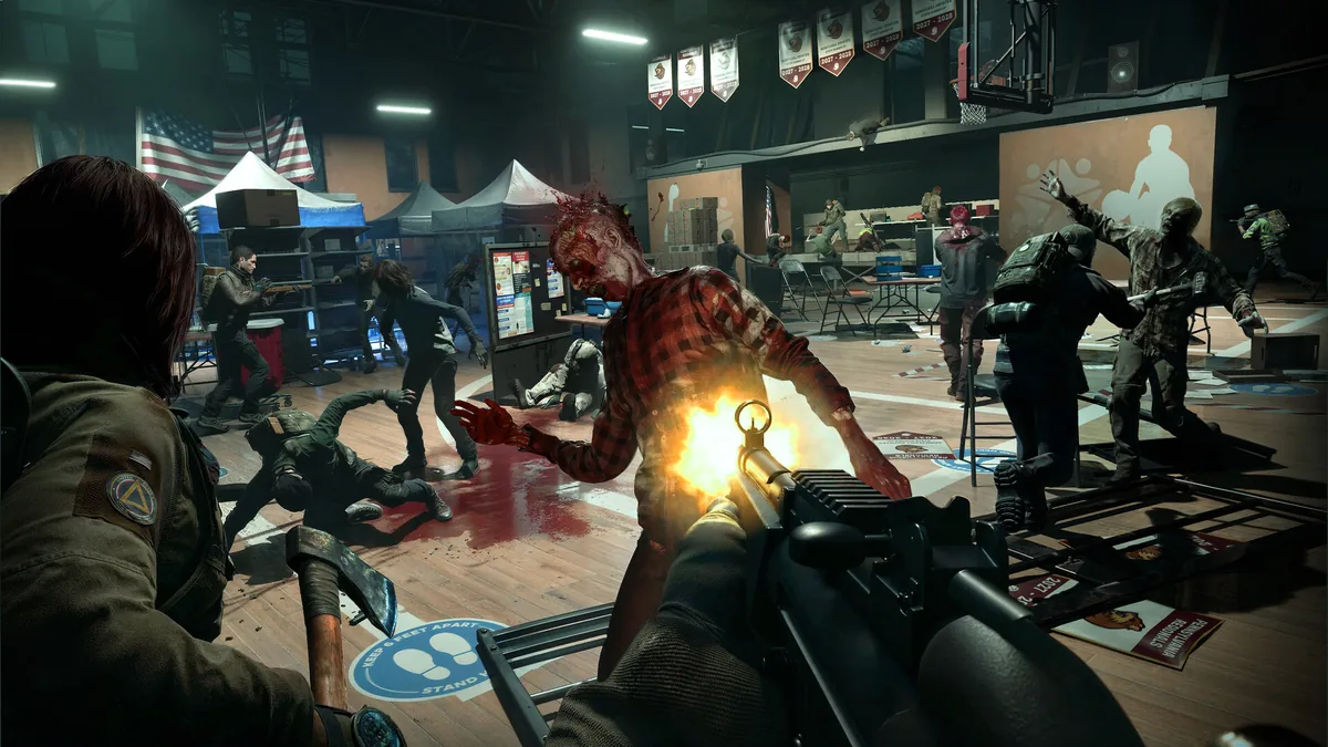 Responders confront zombies inside a brightly lit room in official No More Room in Hell 2 gameplay.